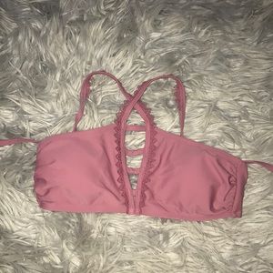 A light pink/ light plum bikini top